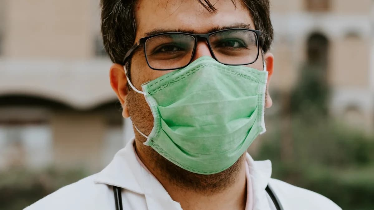 Healthcare technology strategist and clinical informatics director reviewing HIPAA-compliant AI website architecture and zero-trust safeguards